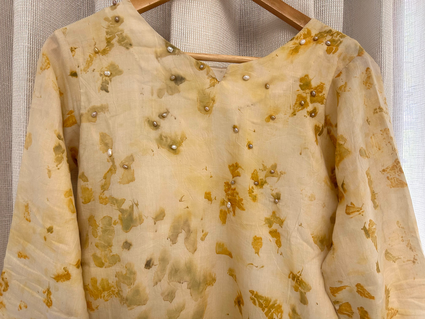 Handwoven Silk naturally printed top embellished with fresh water petals.